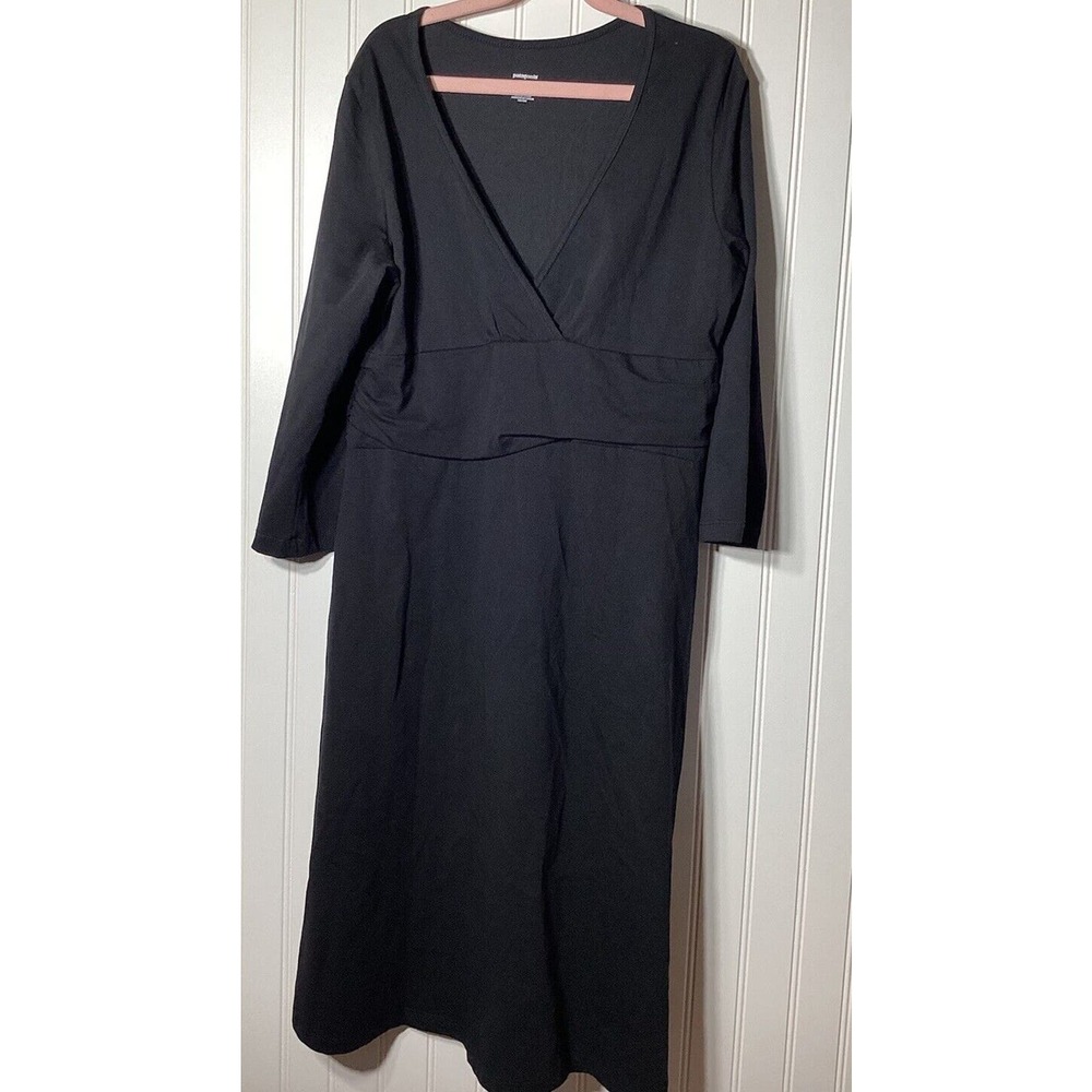Patagonia black dress . size Large. 3/4 “ sleeve. Flare skirt. v neck